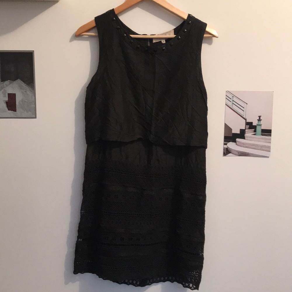 Black silk and lace dress with brass stud details